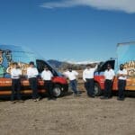 The Comfort Crew HVAC team with service trucks in Denver metro Colorado