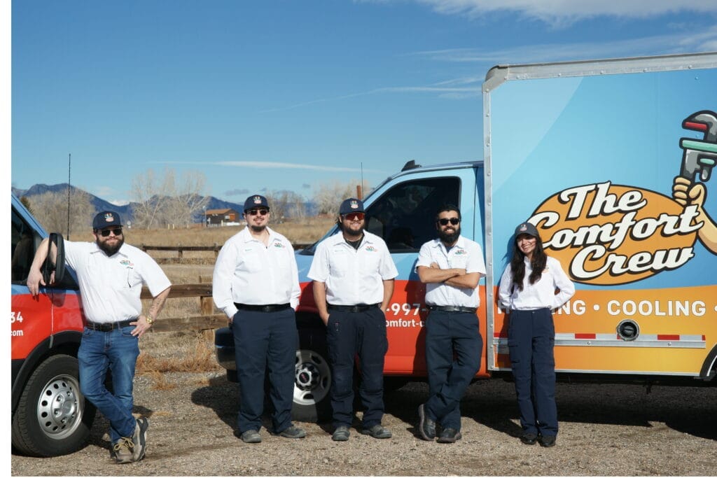 Denver metro HVAC technicians standing beside a Comfort Crew service van, Air Conditioning Maintenance Near Me, air conditioner repair service near me
